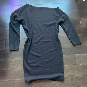 Off-shoulder black sweater dress